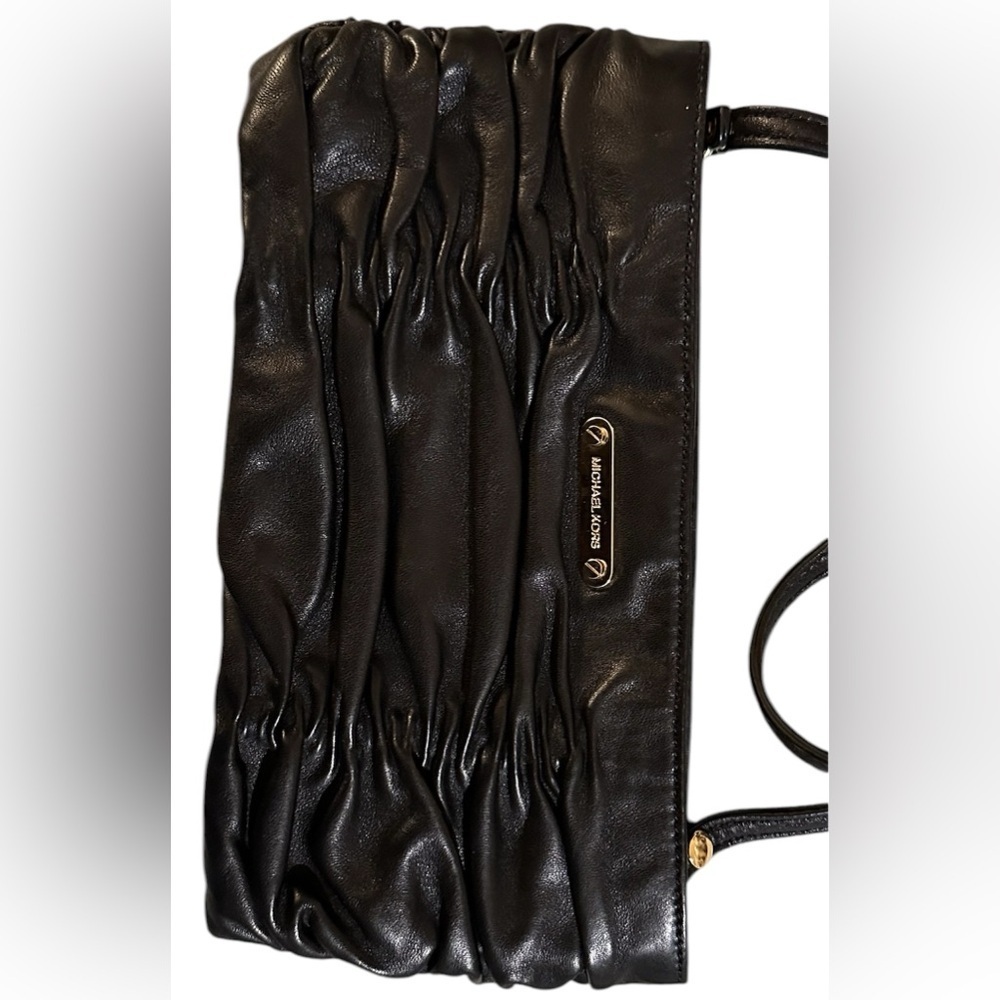 A Michael Kors, black leather Webster wristlet bag